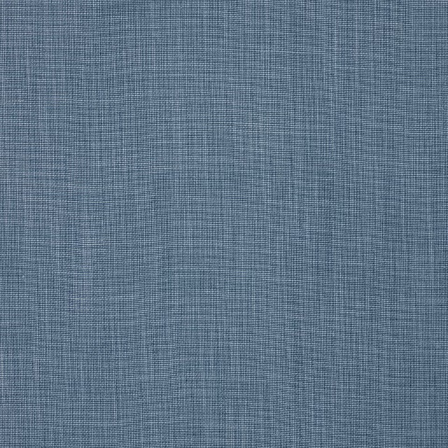 Close-up of soft dusty blue linen plain weave with fine natural slub