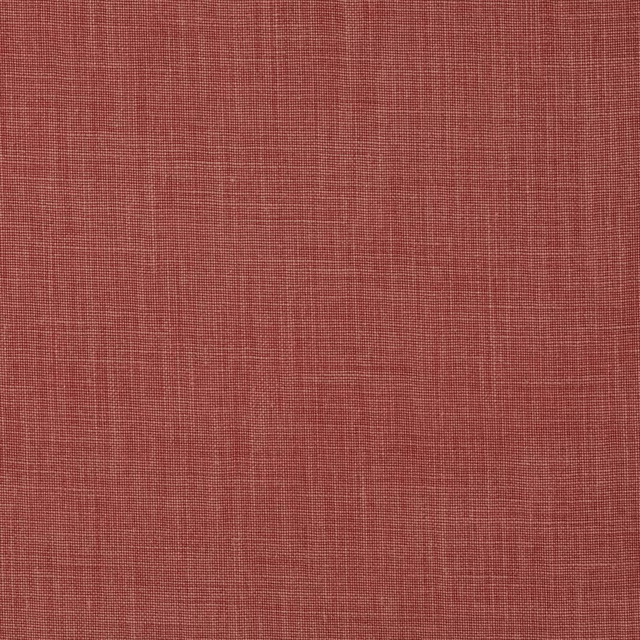 Coral-pink linen swatch with fine plain weave and subtle slubs