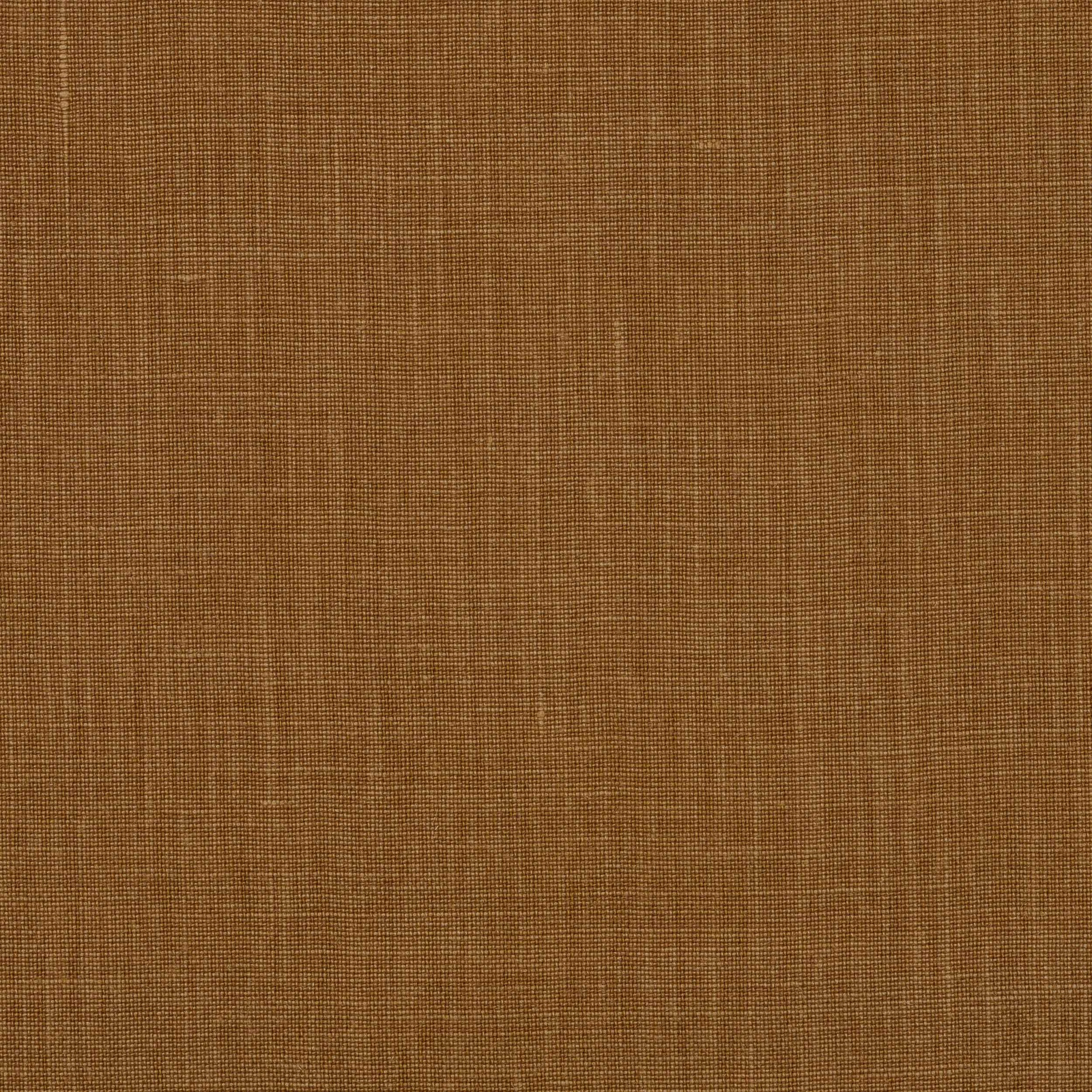 Close-up of warm ochre brown linen with a fine plain weave texture