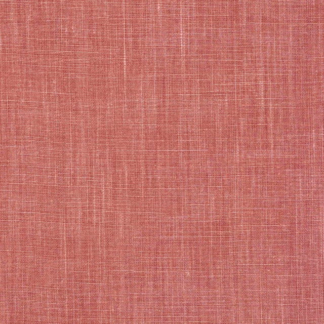Muted rose pink linen swatch with a fine slubby weave and soft texture