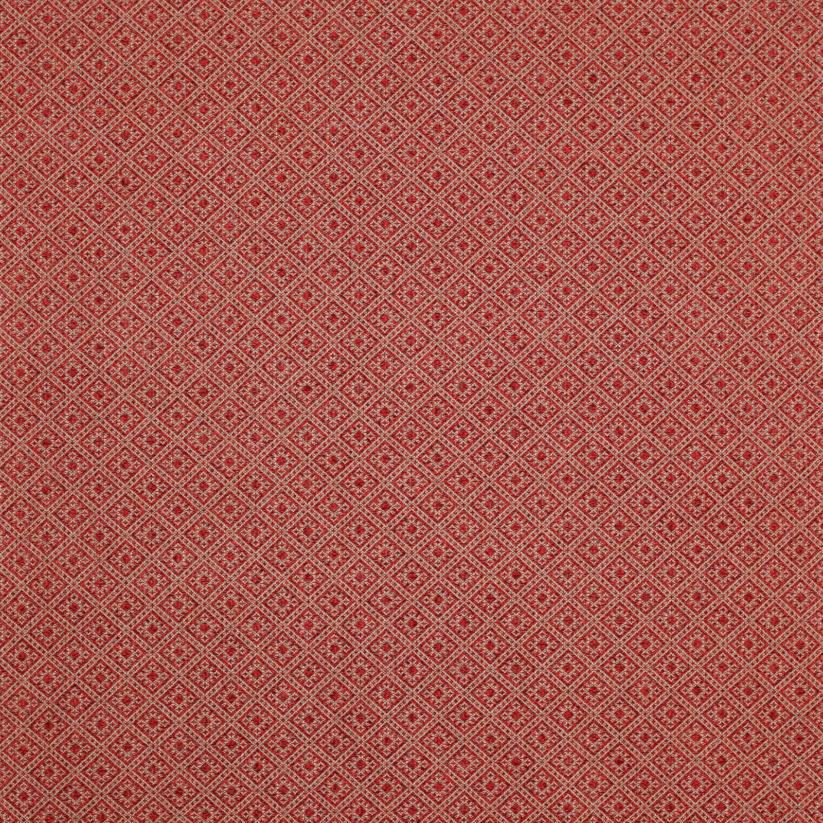 Close-up of warm red geometric woven fabric with tiny diamond lattice pattern