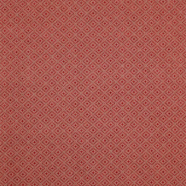 Close-up of warm red geometric woven fabric with tiny diamond lattice pattern