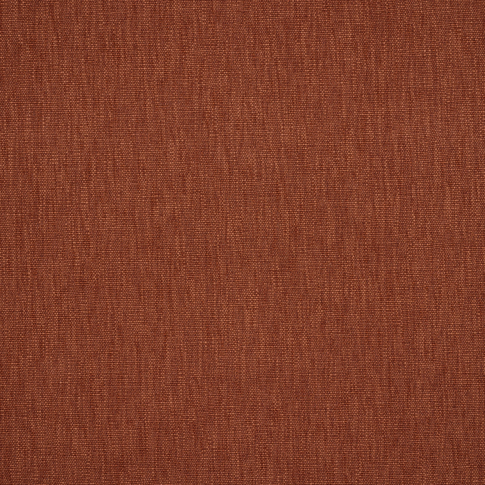 Close-up of a warm rosewood terracotta plain weave fabric with fine texture