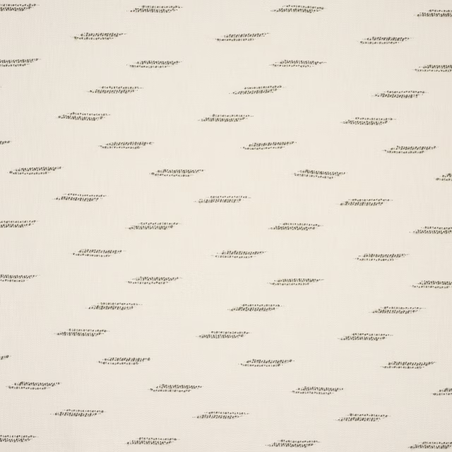 Pale jade fabric with small scattered dash-like motif on a soft woven ground