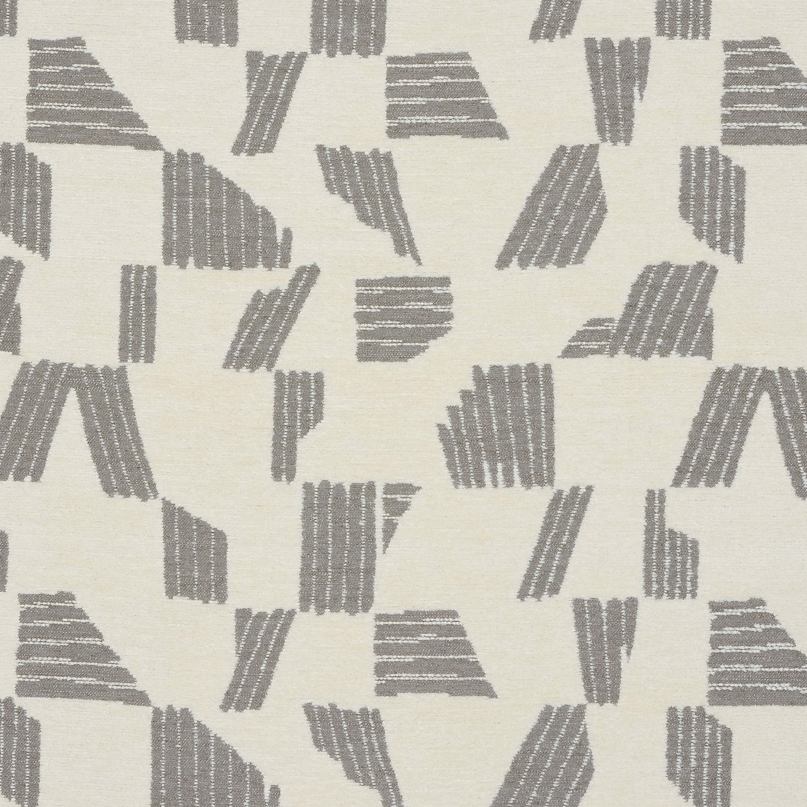 Steel-grey geometric woven motifs on a pale ivory fabric swatch