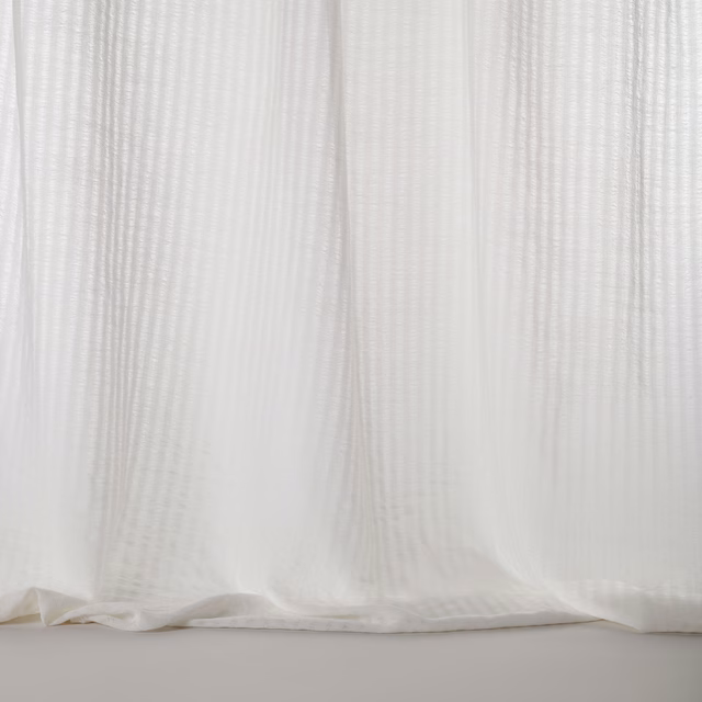 Sheer ivory-white fabric with subtle vertical stripe texture and soft drape