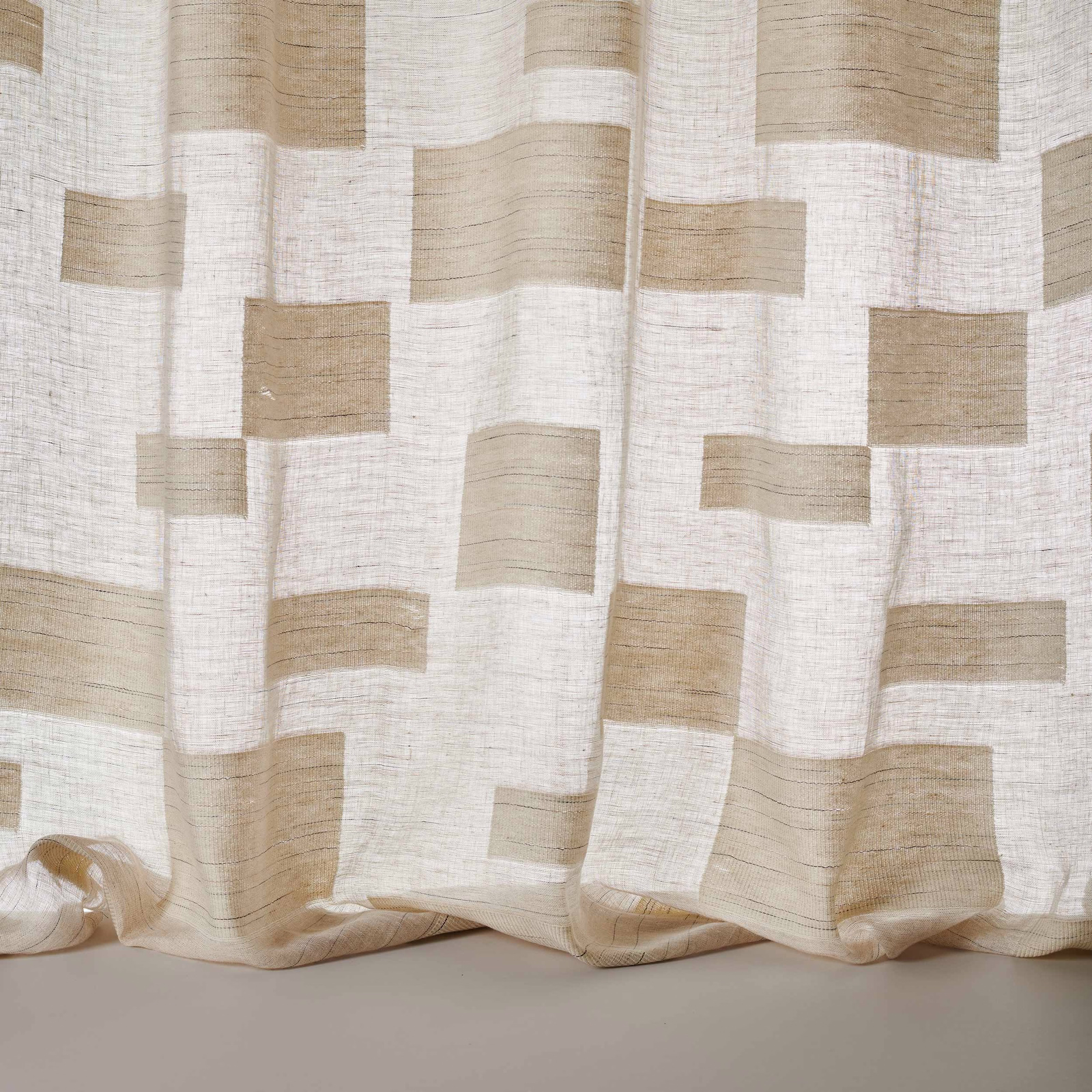 Ivory fabric with soft beige block pattern and subtle linen texture