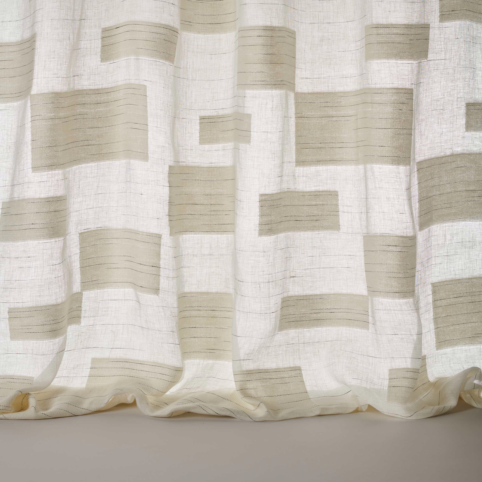 White linen-cotton fabric with large pale oat block pattern and soft texture