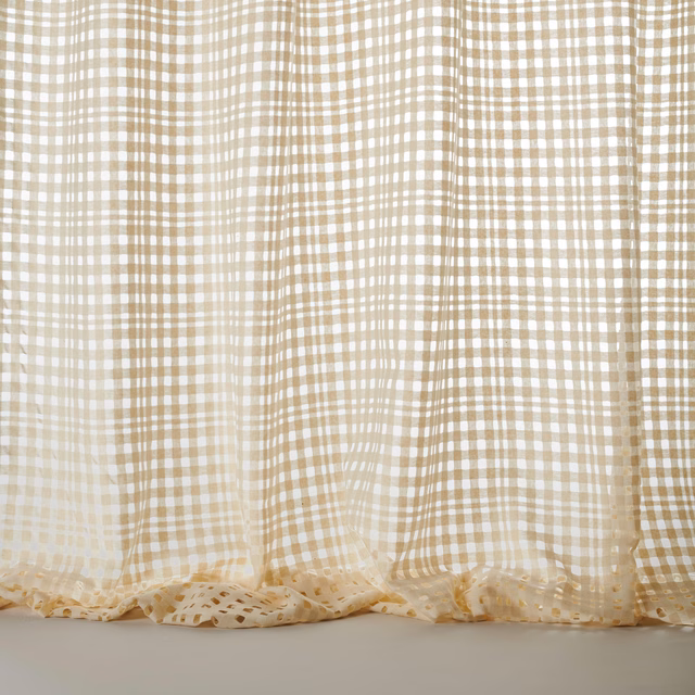 Sheer cream checked fabric with a soft grid weave and light drape