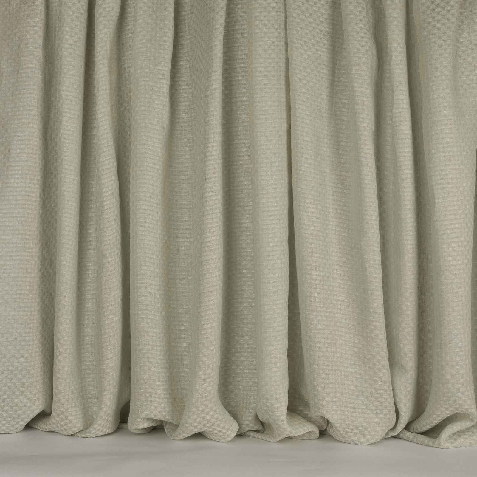 Pale cream linen-blend fabric with a fine woven texture and soft curtain folds