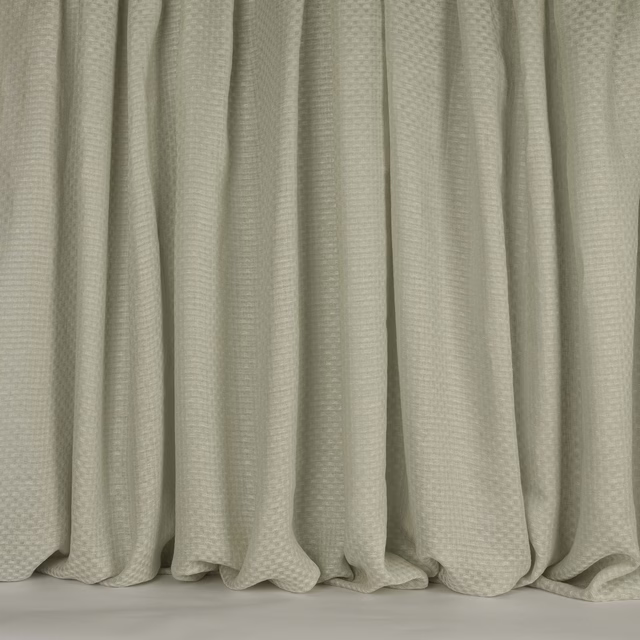 Pale cream linen-blend fabric with a fine woven texture and soft curtain folds