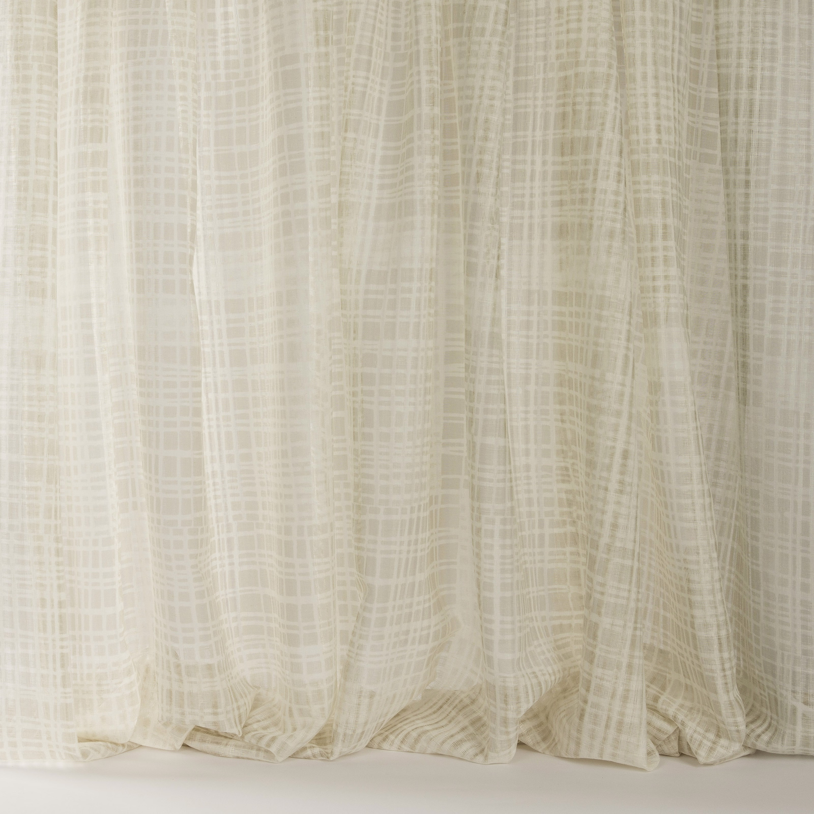 Sheer warm clay-beige fabric with a fine grid weave and soft vertical folds