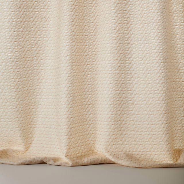 Creamy beige wool fabric with subtle vertical striped texture and soft drape