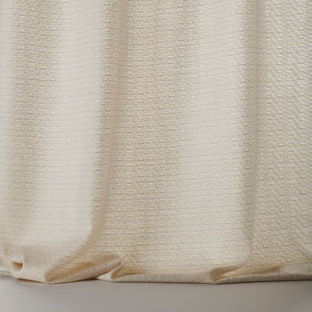 Cream wool fabric swatch with fine woven texture and subtle vertical folds