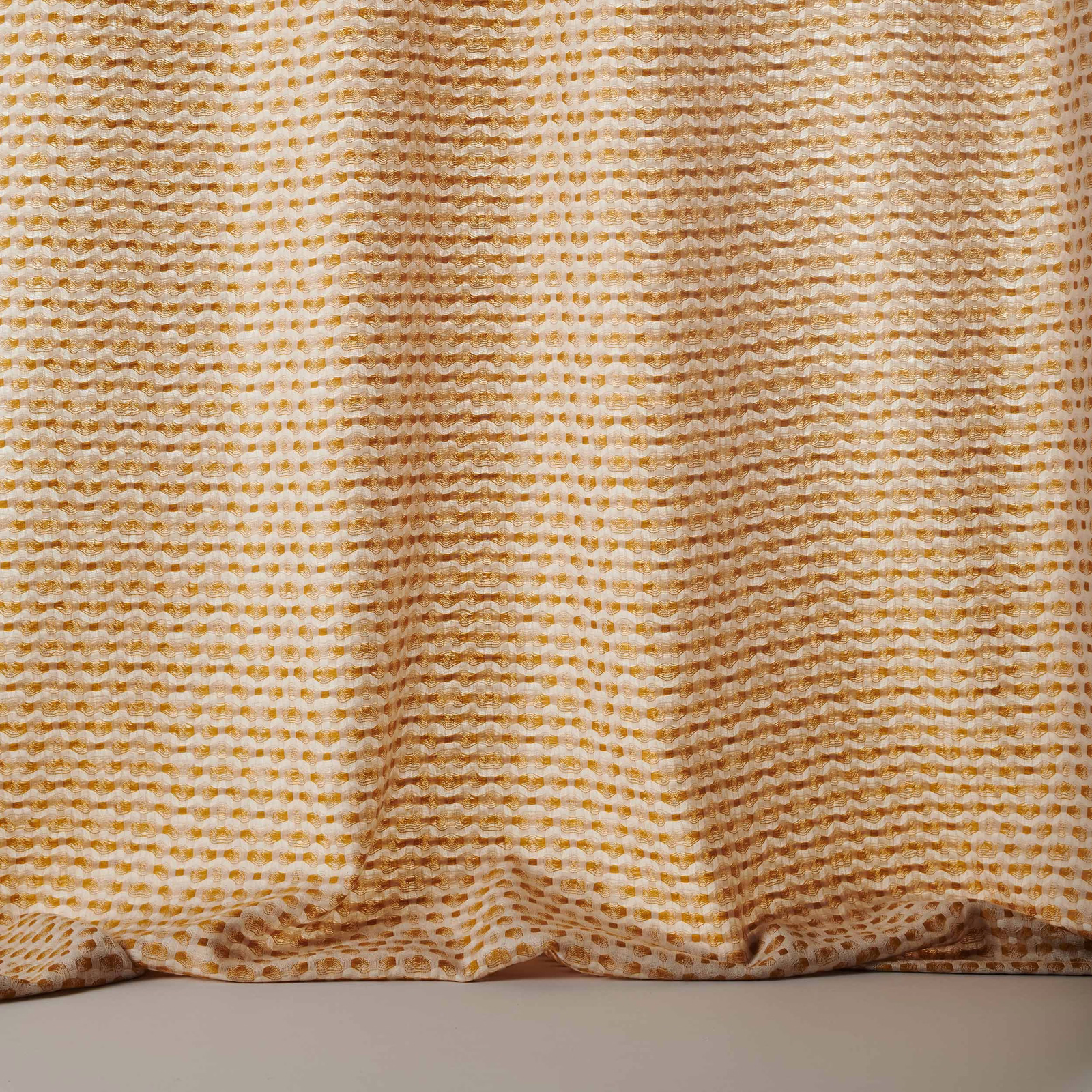 Warm saffron yellow woven stripe fabric with creamy highlights and textured wool surface