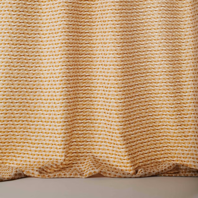 Warm saffron yellow woven stripe fabric with creamy highlights and textured wool surface