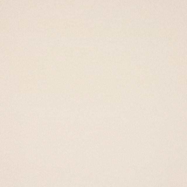 Close-up of a soft warm cream plain fabric with fine matte texture