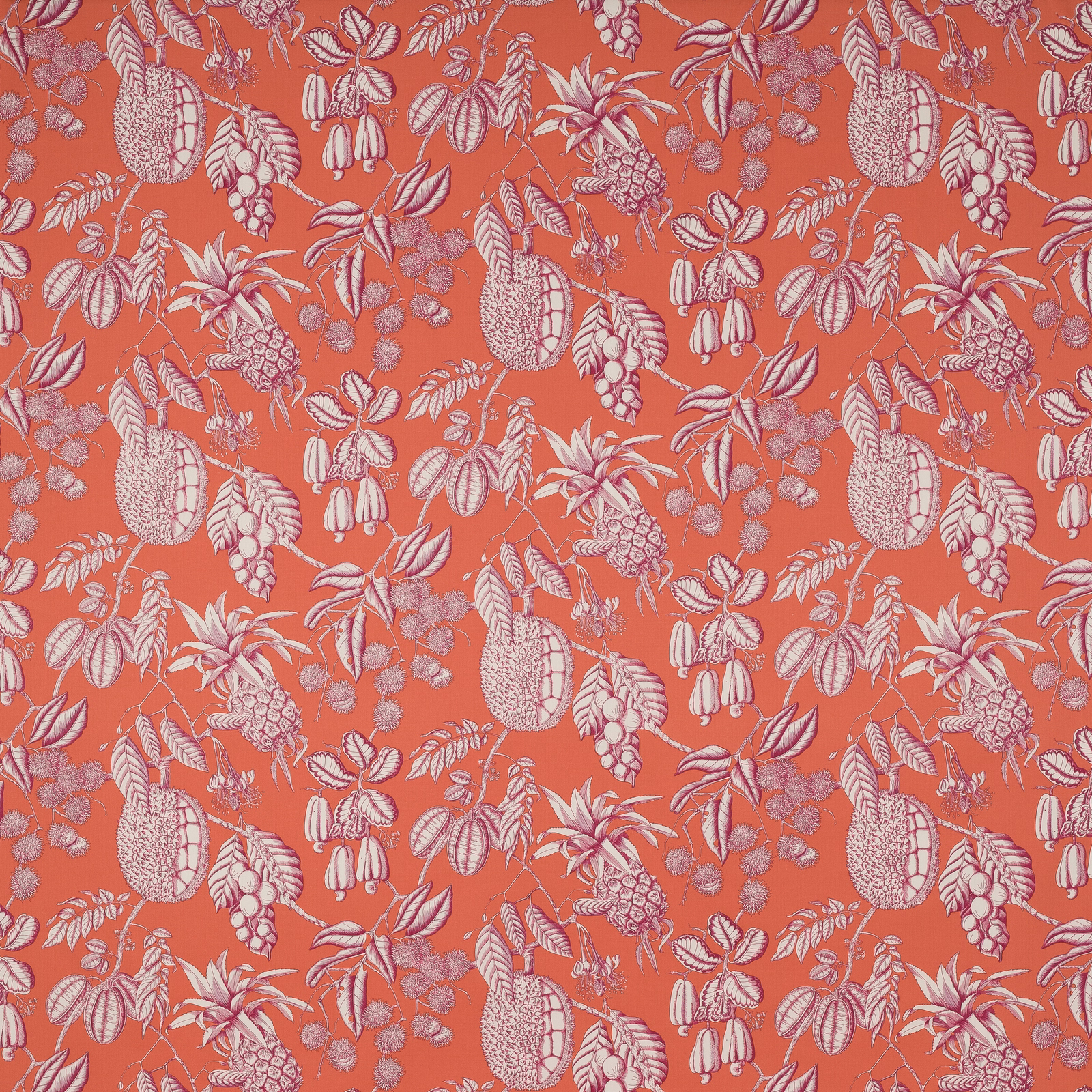 Bright orange botanical fabric with pale leaf and fruit motifs