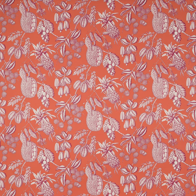 Bright orange botanical fabric with pale leaf and fruit motifs