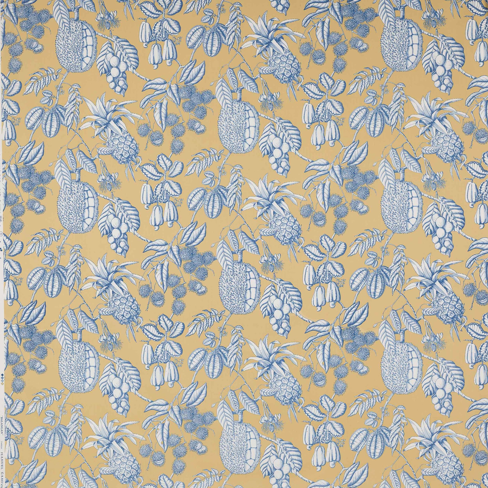 Blue botanical fruit and leaf print on warm ochre cotton fabric