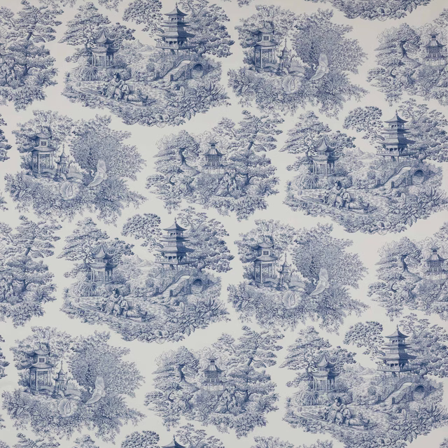Blue toile fabric with pagodas, trees and garden scenes on a pale ground