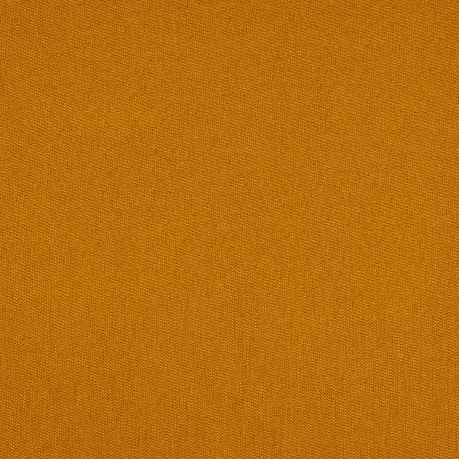 Solid warm amber-gold linen fabric swatch with a fine matte weave