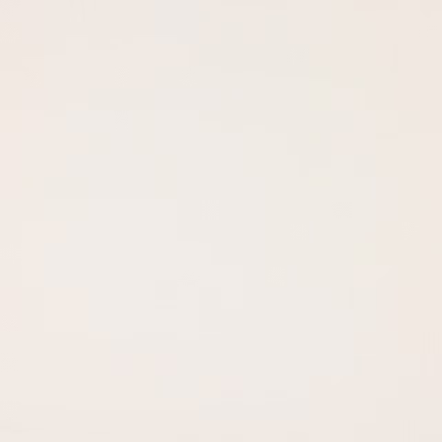 Plain soft ivory linen fabric with a smooth natural texture