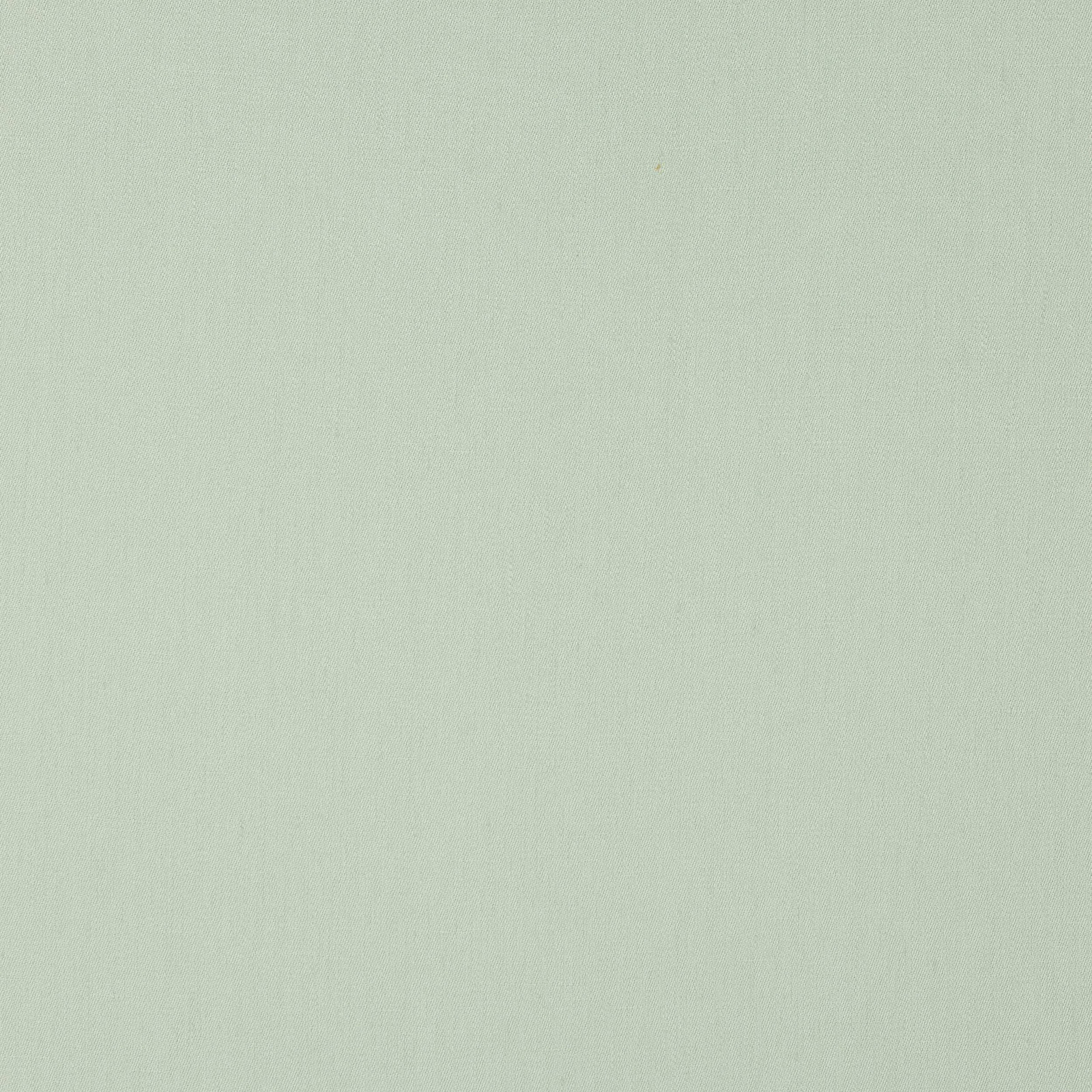 Soft pale jade linen swatch with a smooth plain weave