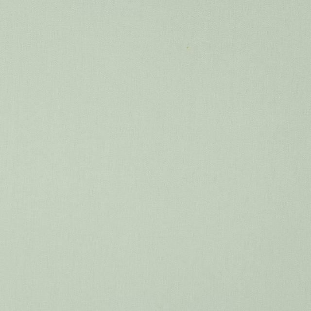 Soft pale jade linen swatch with a smooth plain weave