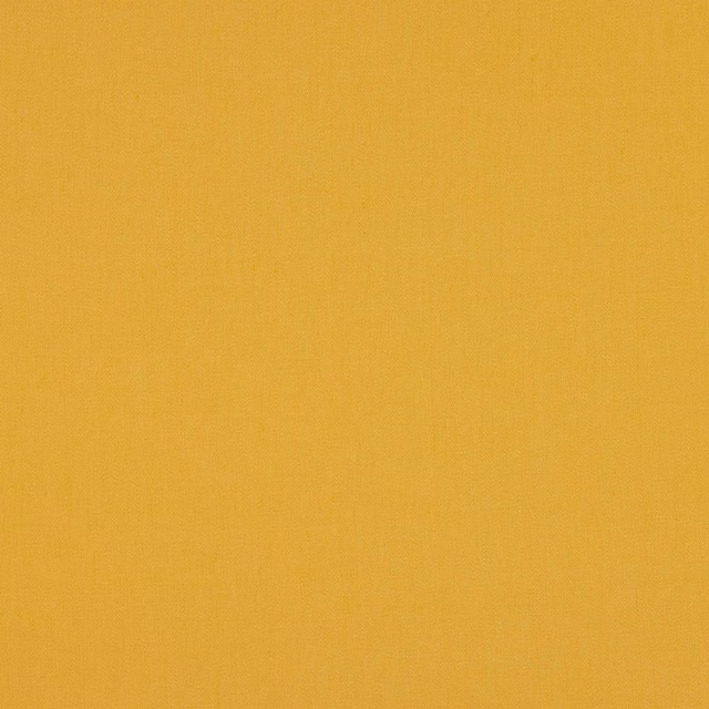 Solid saffron yellow linen swatch with a fine plain weave and matte texture