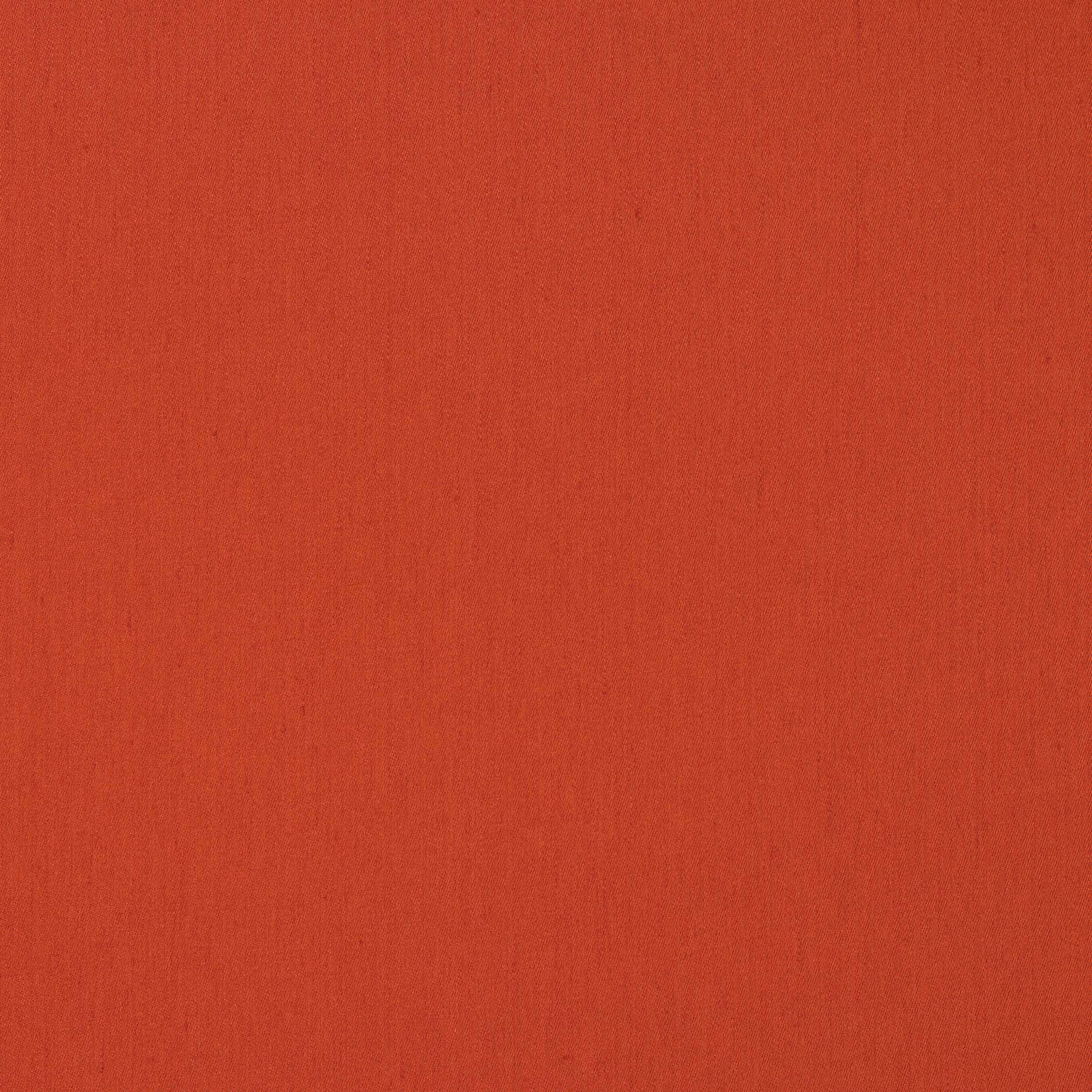 Plain warm terracotta linen swatch with fine natural weave