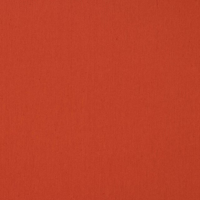 Plain warm terracotta linen swatch with fine natural weave