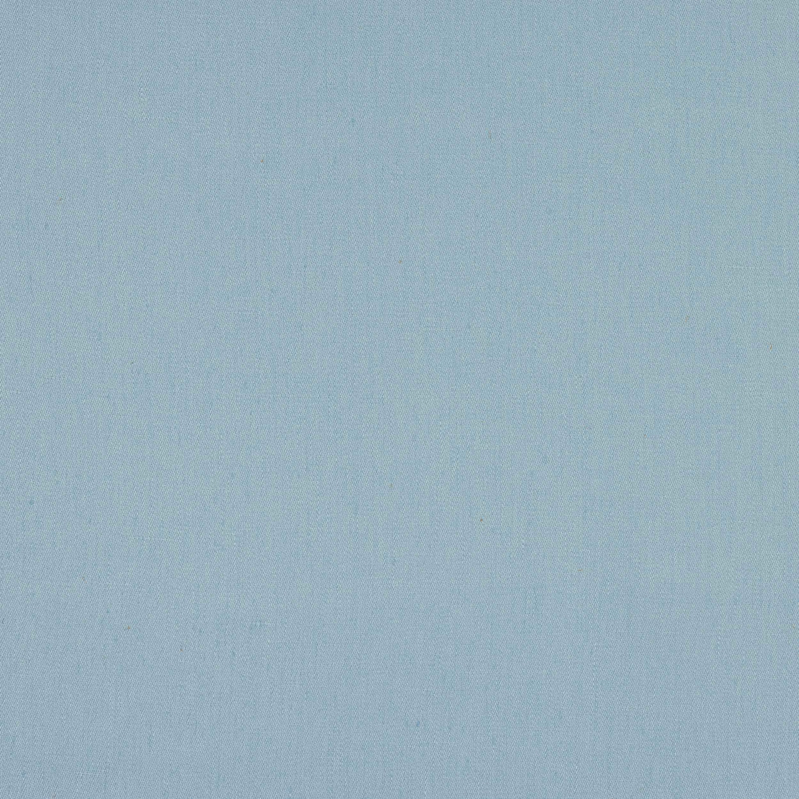 Pale sky-blue linen fabric with a fine plain weave and soft texture