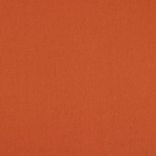 Solid warm terracotta linen fabric with a fine natural weave