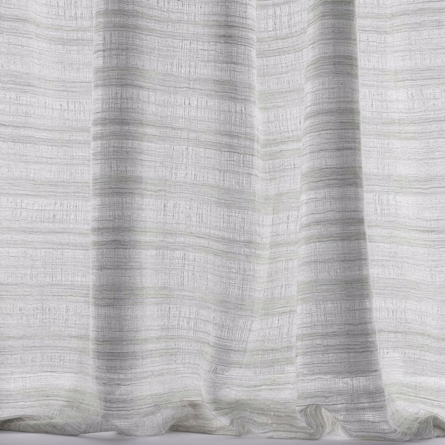 Pale silver-grey woven fabric with soft vertical folds and subtle slub texture