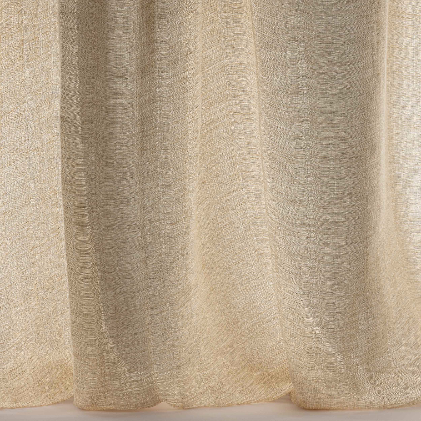 Soft sandy beige linen-wool fabric with subtle slubbed texture and gentle folds