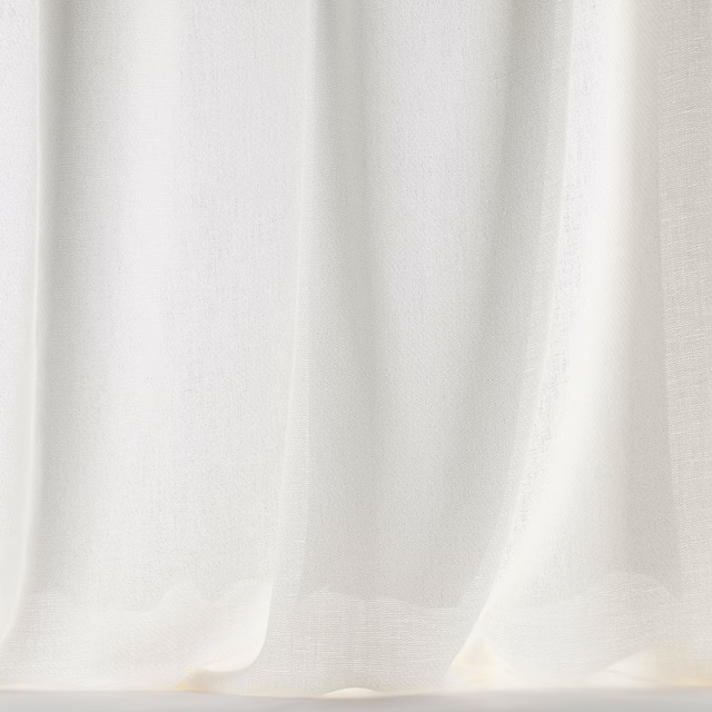 Soft bone-white wool fabric hanging in gentle vertical folds