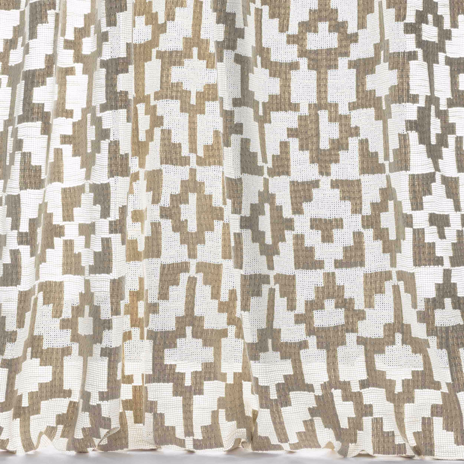 Warm beige and ivory abstract woven fabric with a pixel-like geometric repeat