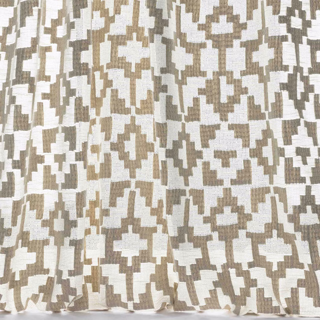 Warm beige and ivory abstract woven fabric with a pixel-like geometric repeat