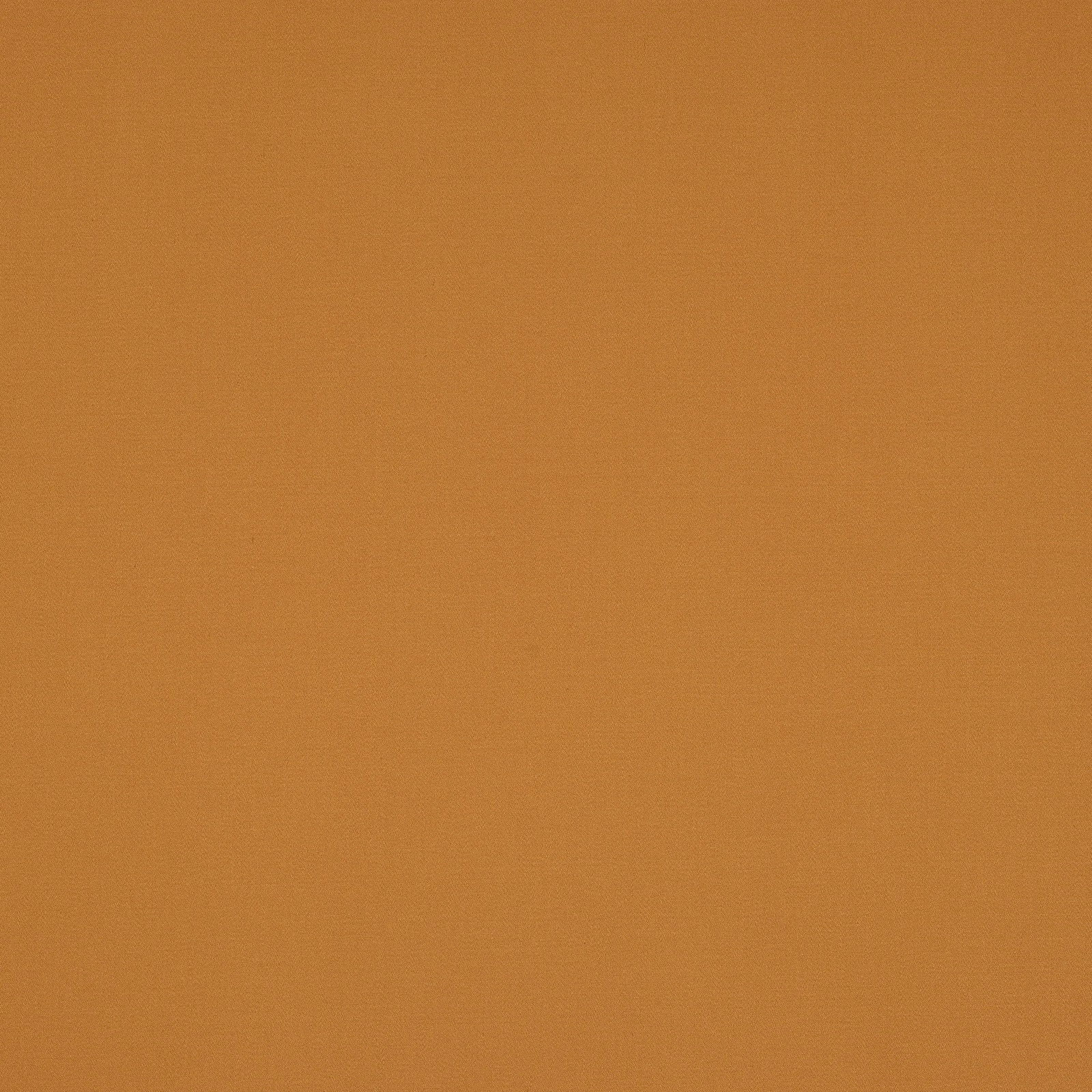 Solid amber-orange cotton fabric with a fine plain weave