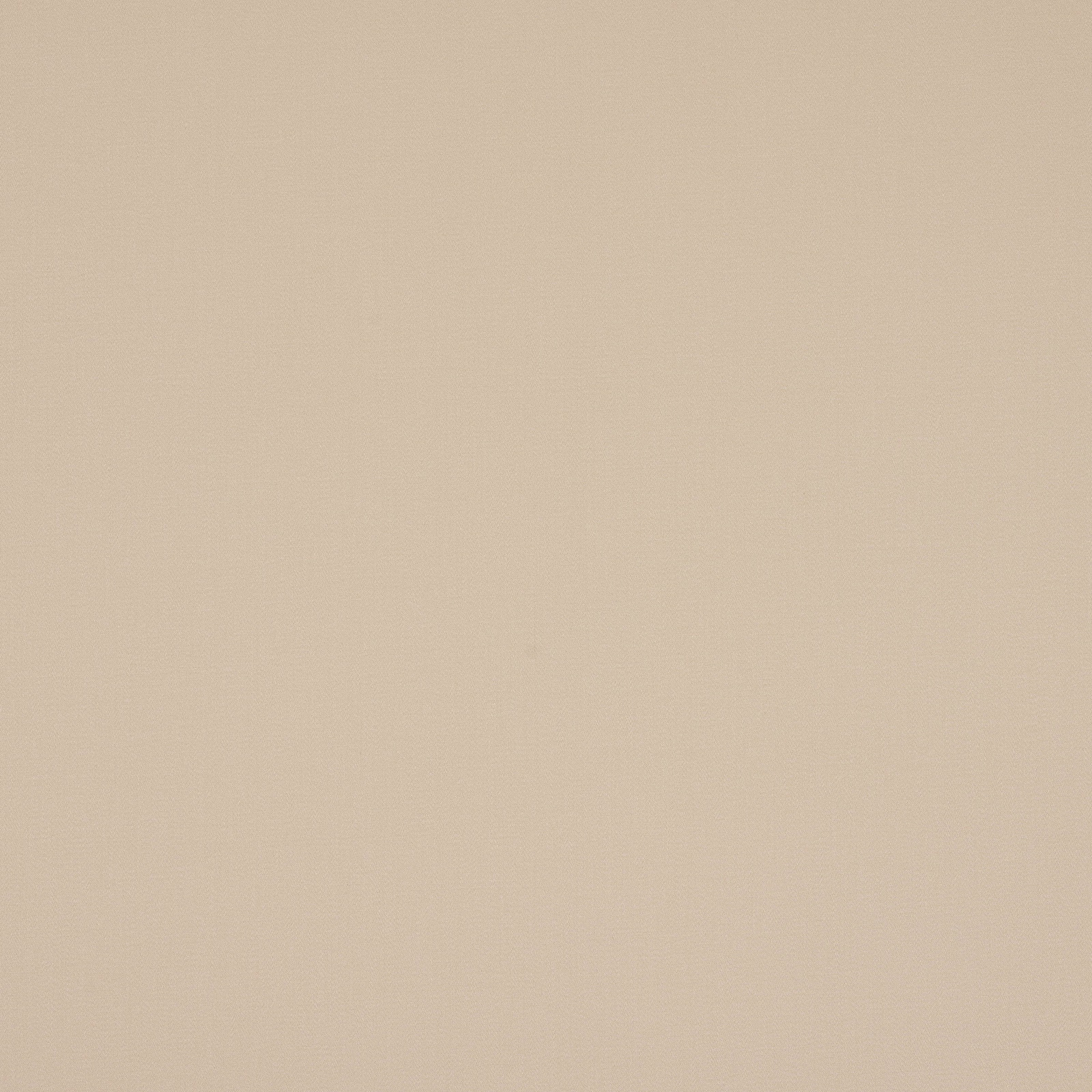 Close-up of a plain soft warm beige cotton fabric swatch