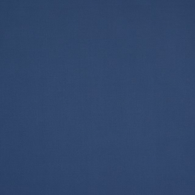 Plain muted slate blue cotton swatch with fine woven texture