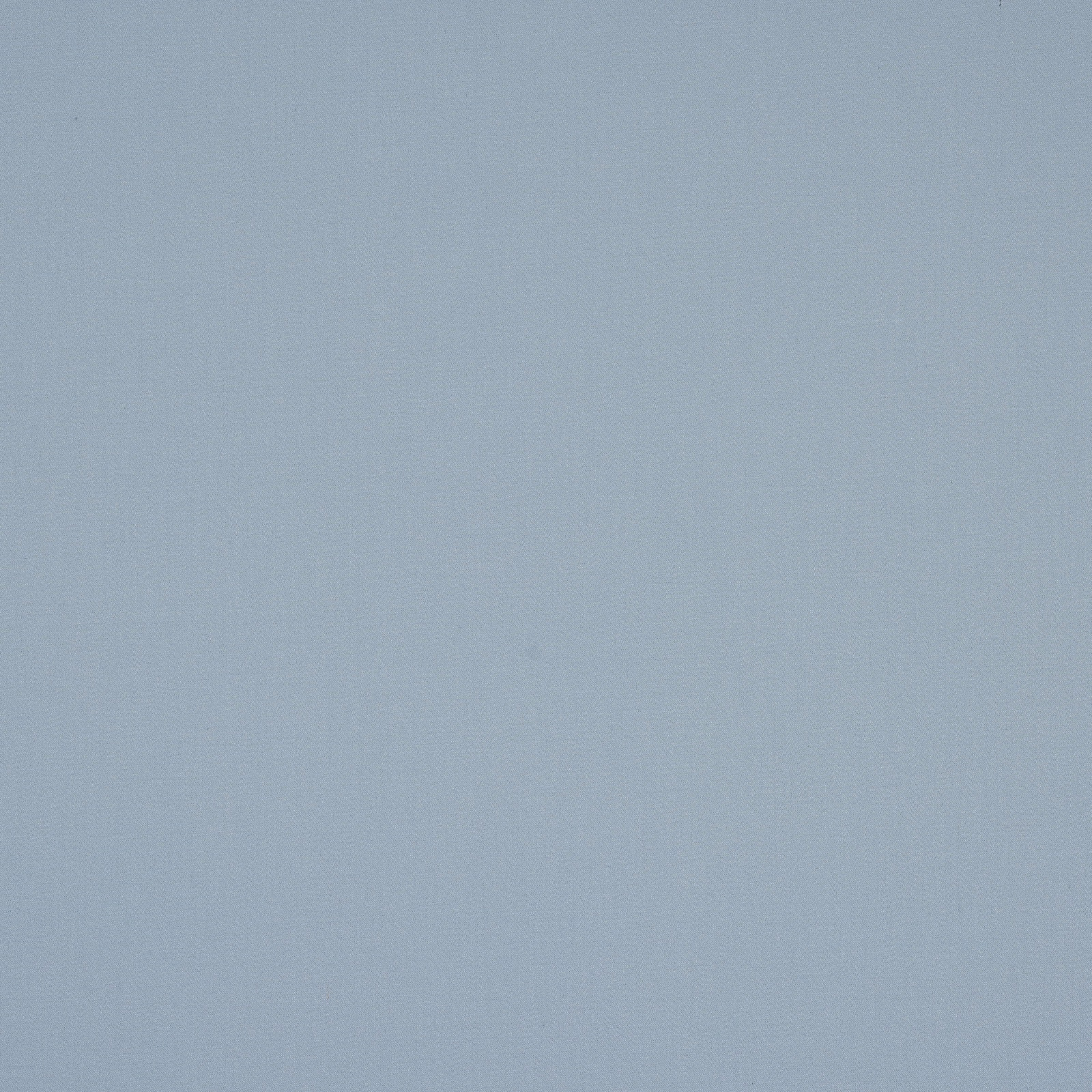 Plain pale powder blue cotton fabric with a smooth matte weave