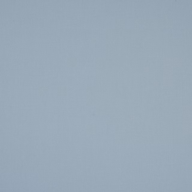 Plain pale powder blue cotton fabric with a smooth matte weave