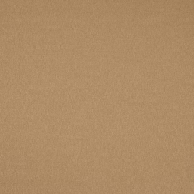 Plain warm sandy beige cotton fabric with a fine woven texture