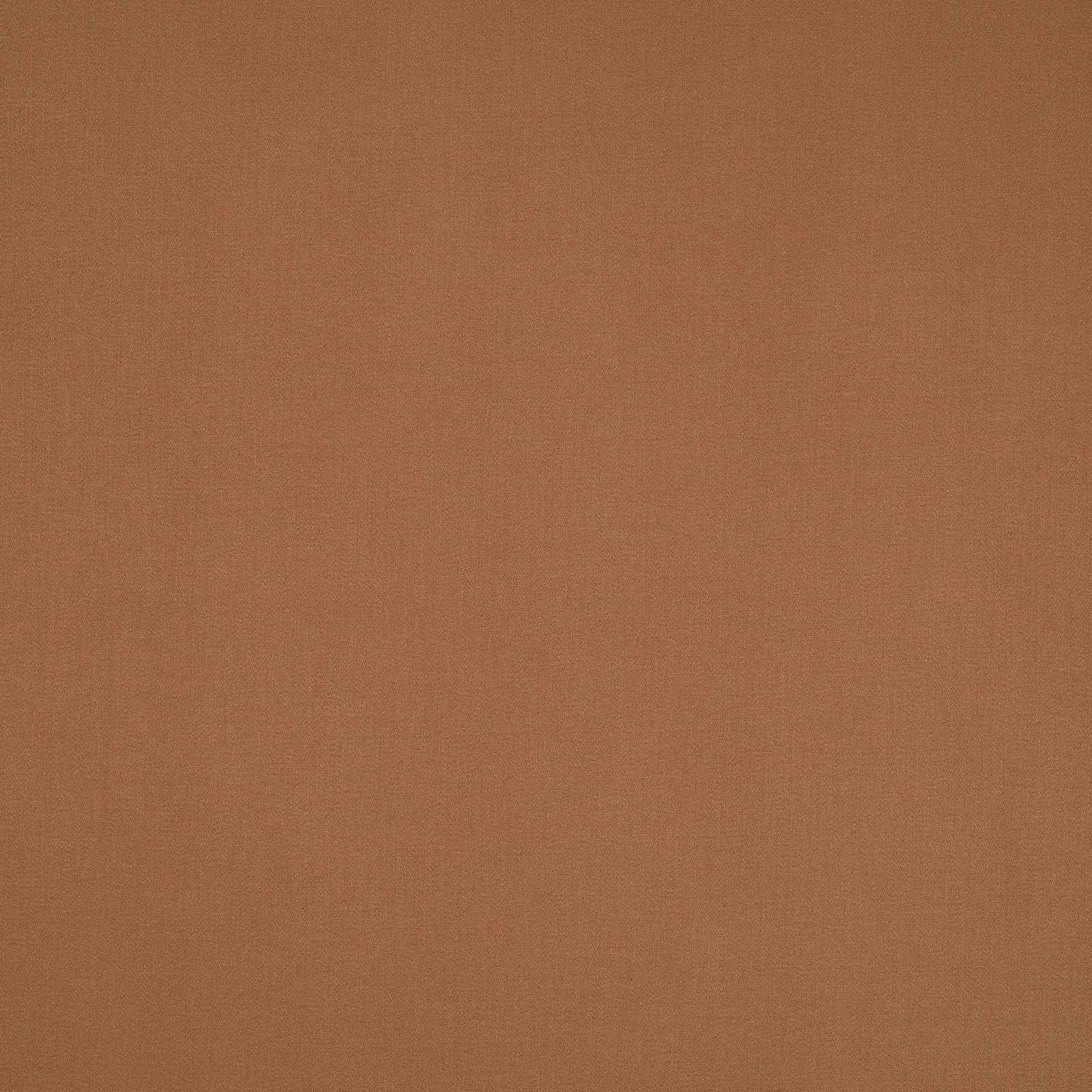 Warm terracotta-canelle plain cotton fabric swatch with fine woven texture
