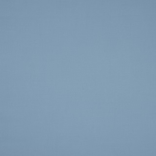 Solid powder blue cotton fabric with a smooth matte weave
