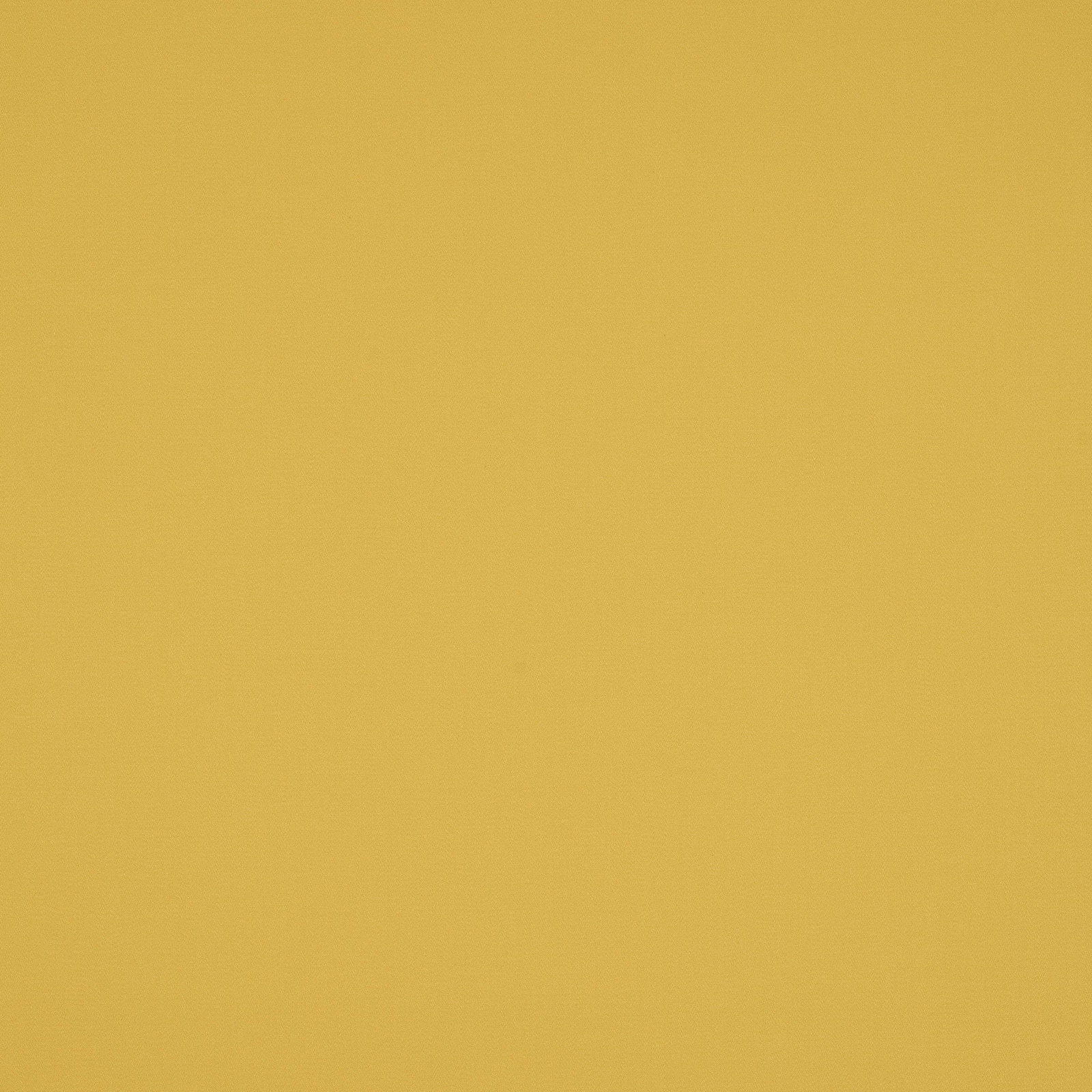 Solid warm curry yellow cotton fabric with a smooth matte surface