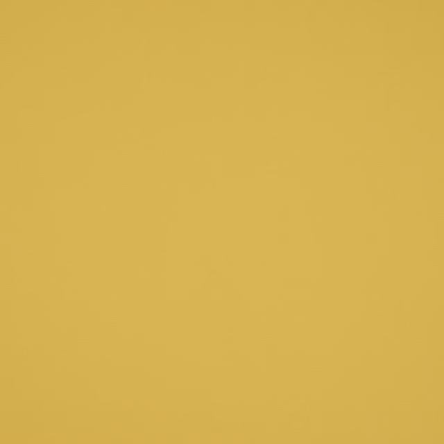 Solid warm curry yellow cotton fabric with a smooth matte surface