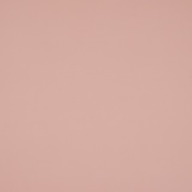 Soft powdery blush plain cotton fabric with a smooth matte weave